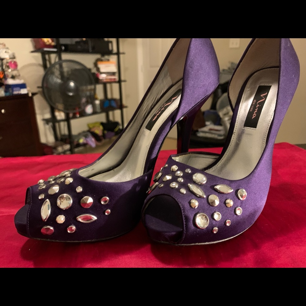 Purple jeweled open toe pumps